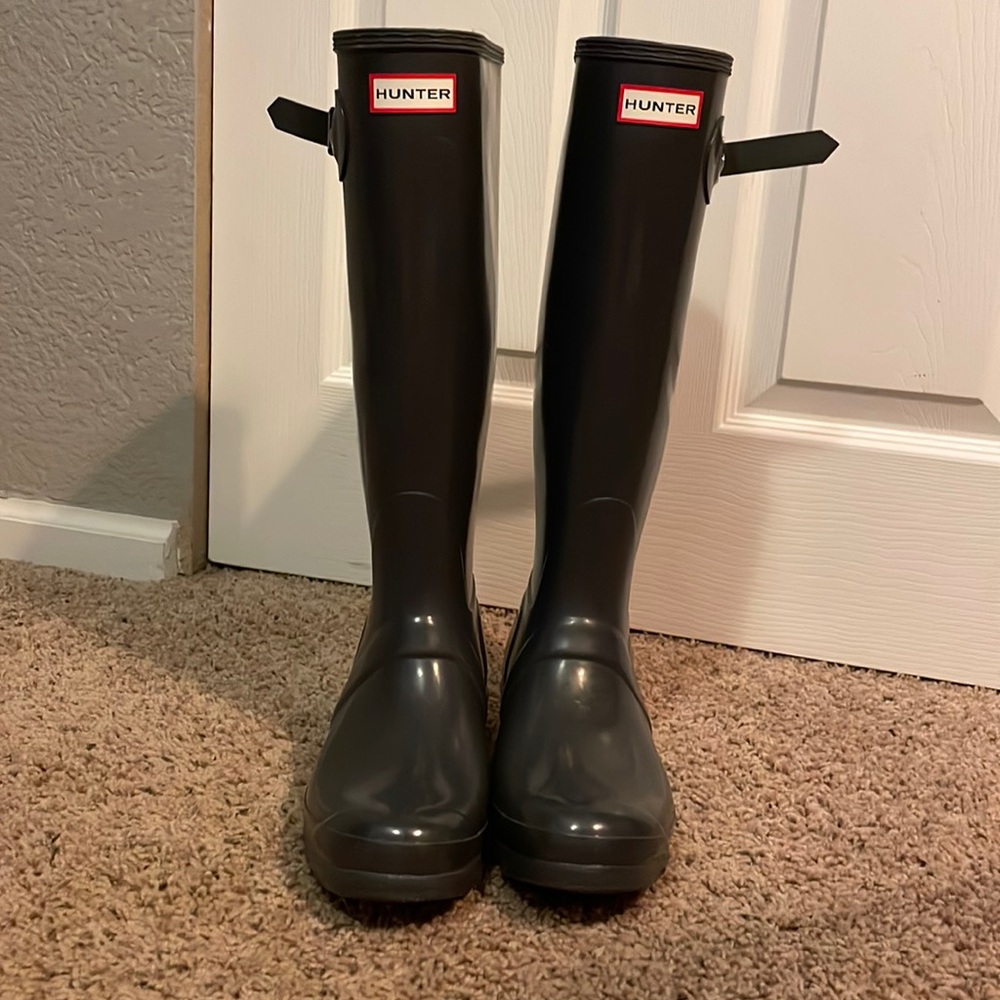 Gray hunter rain boots.